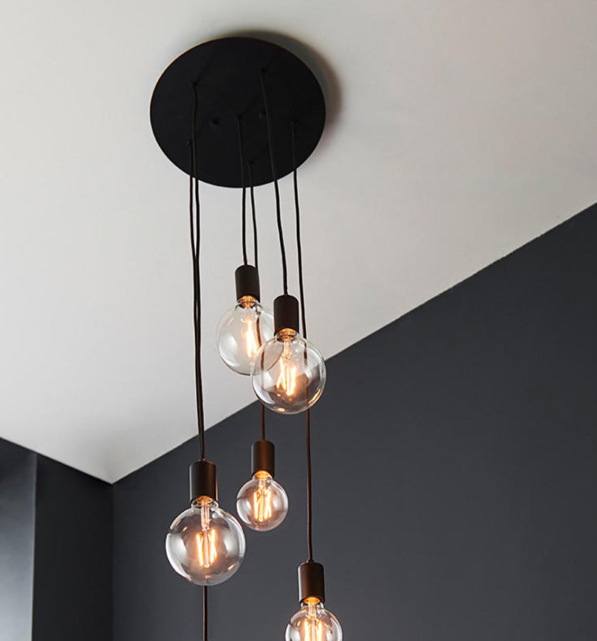 Black pendant holder with tinted bulbs